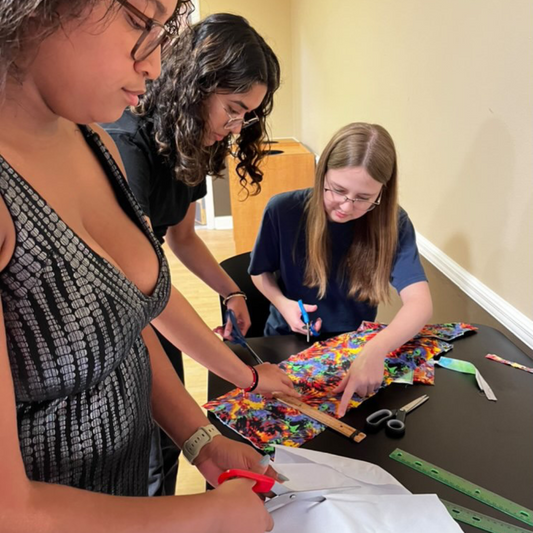 The PERIOD. Chapter at the University of Central Florida making reusable pads to donate in collaboration with Days for Girls!