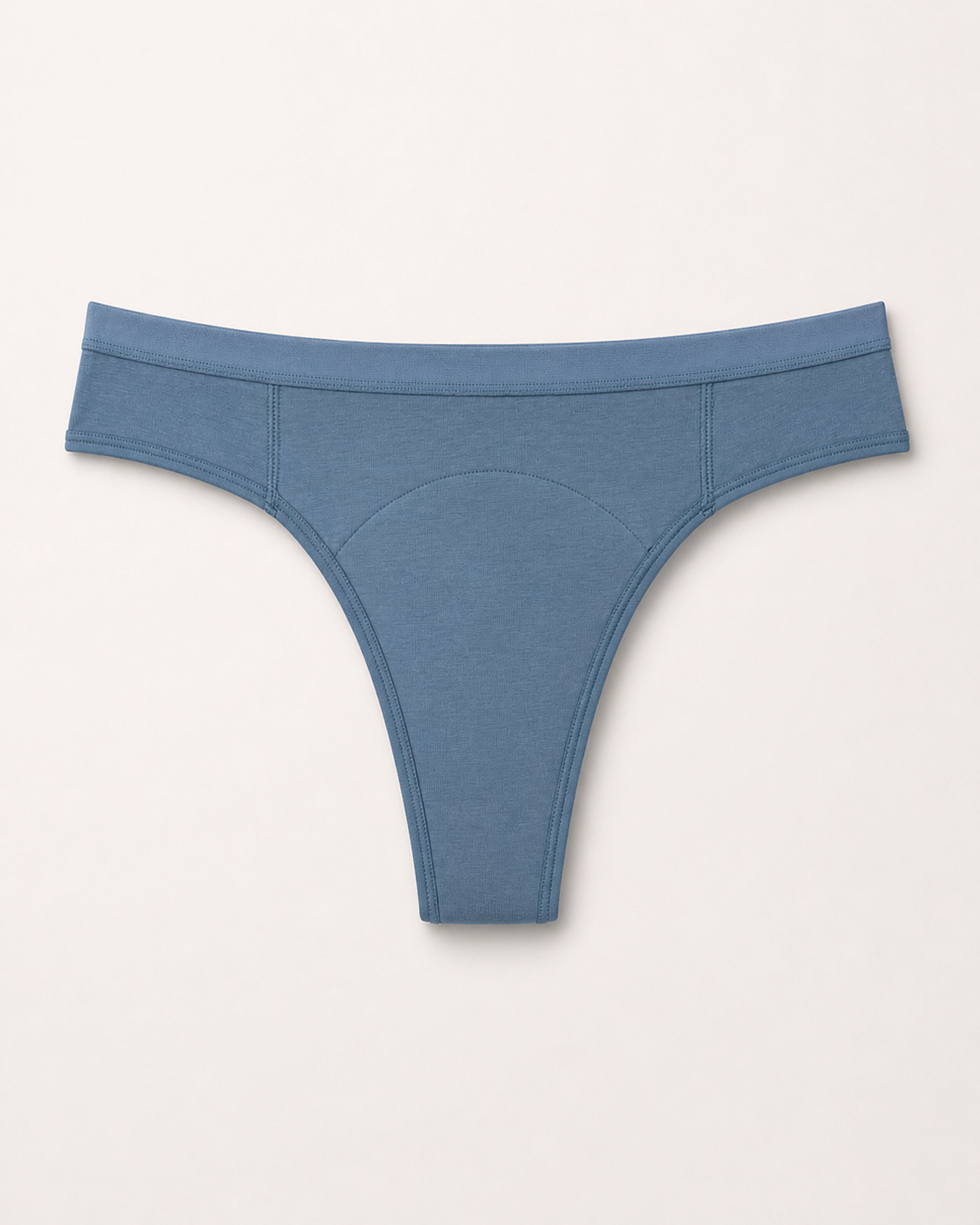 Blue thong on a light gray background | Denim