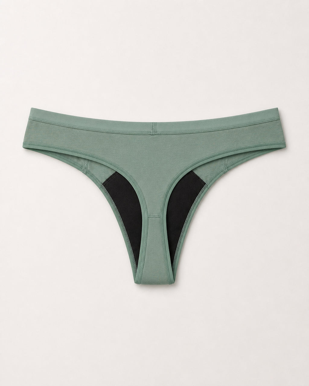 Green thong with black accents on a light gray background | Eucalyptus