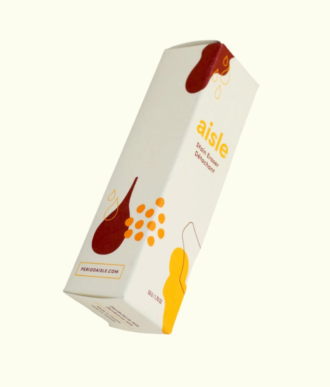 A box of 'aisle' brand natural stain remover with a graphic of a red stain and orange dots on a white background.